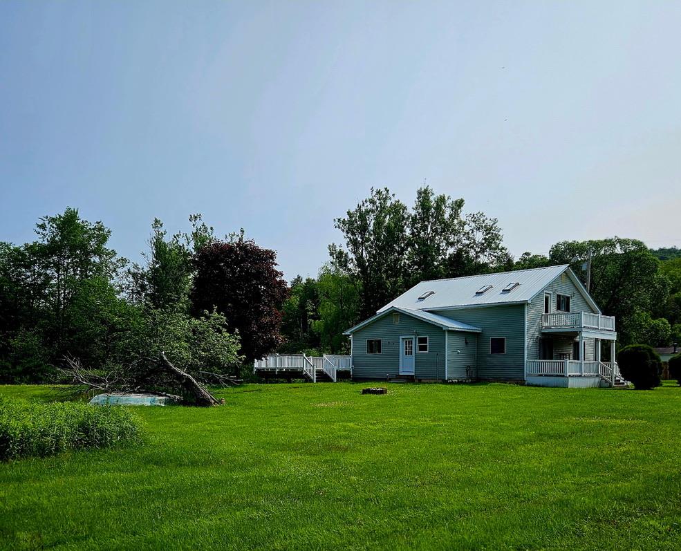 141 Bonnie Brook Road Roscoe, NY 12776 - Photo 47 of 48 View of green lawn with a balcony and view of scattered trees