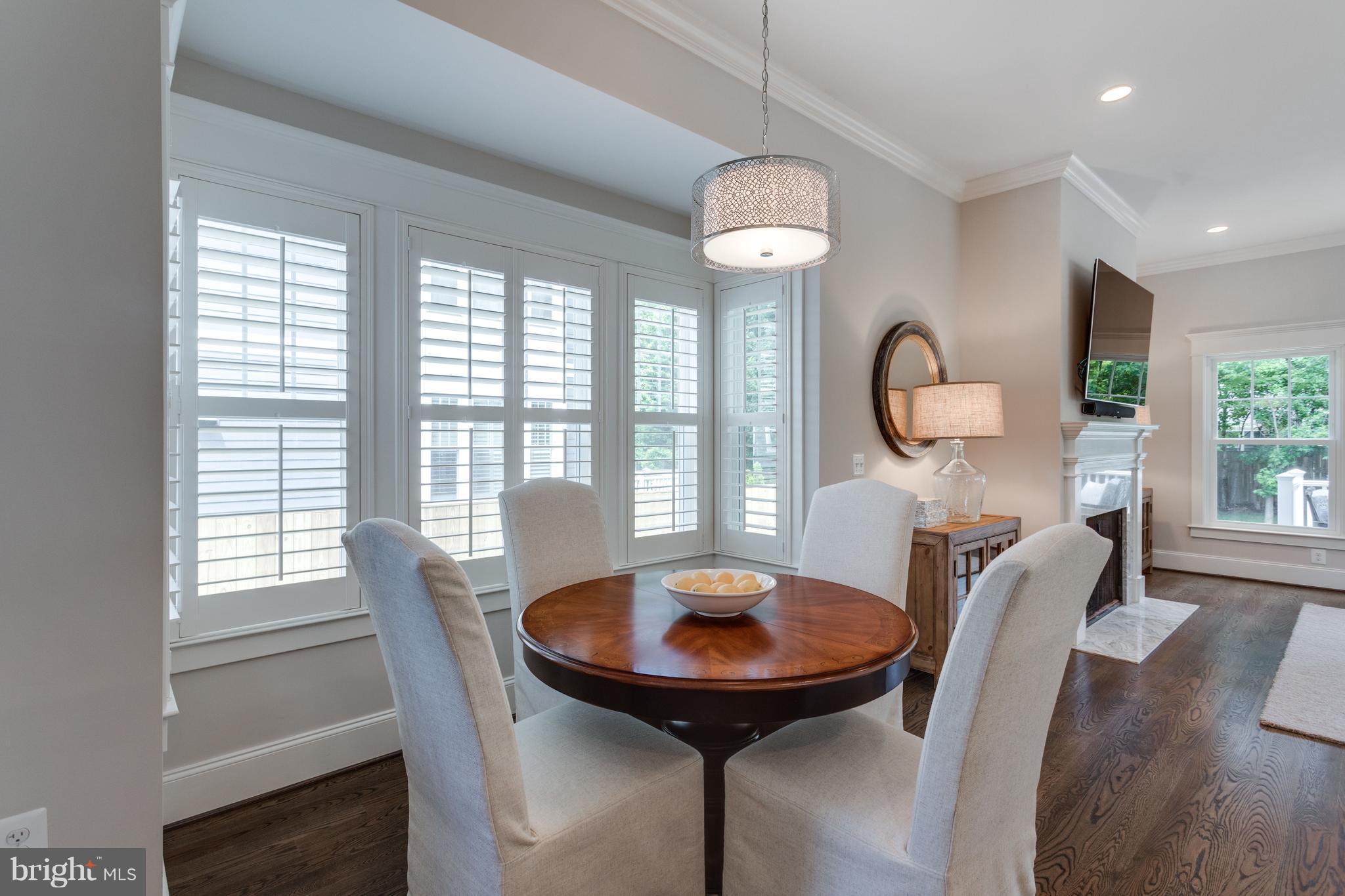 8115 Wellington Road Alexandria, VA 22308 - Photo 15 of 30 Light-filled breakfast room and Craftsman molding