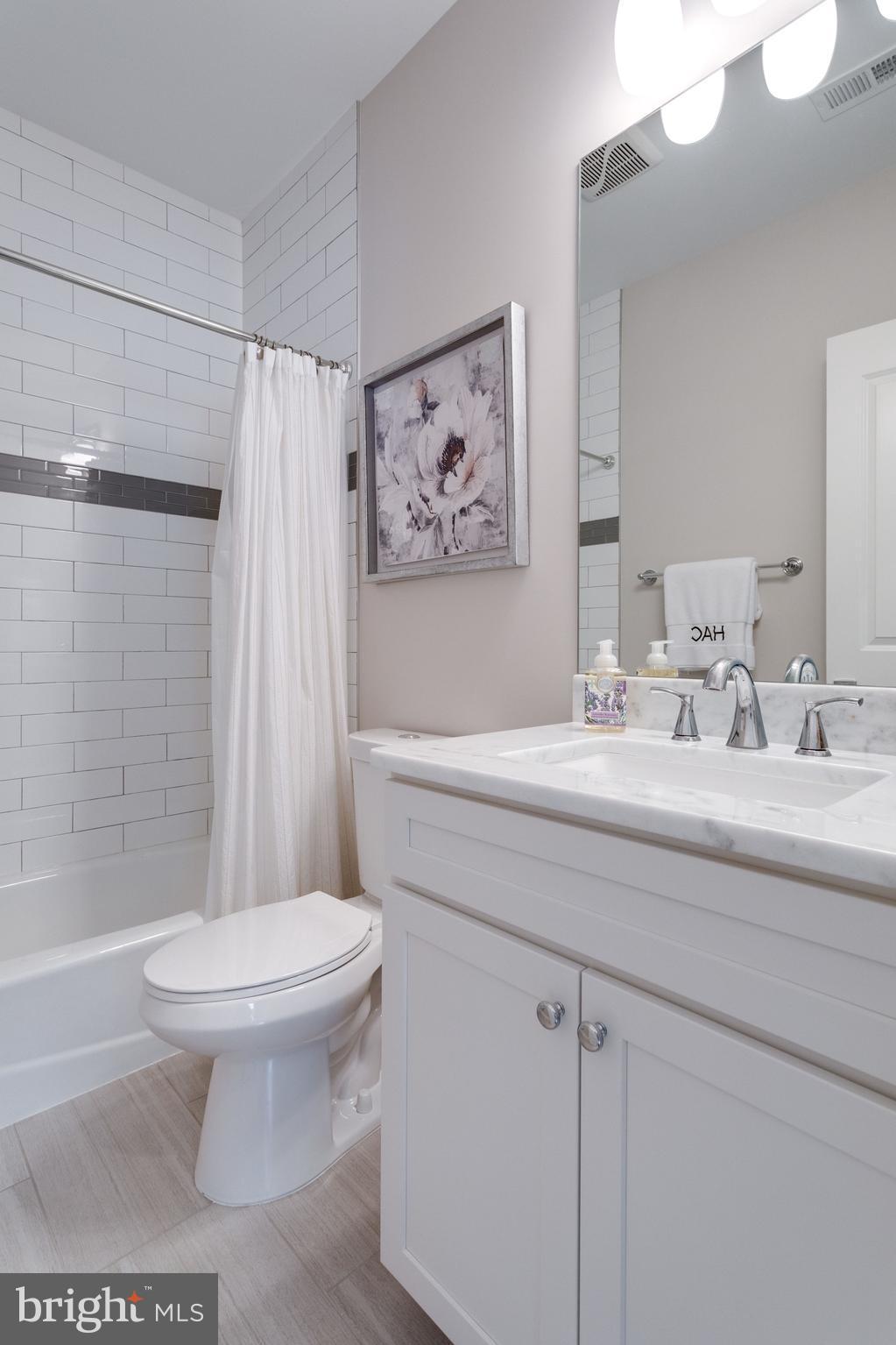 8115 Wellington Road Alexandria, VA 22308 - Photo 21 of 30 Three upper-level full baths