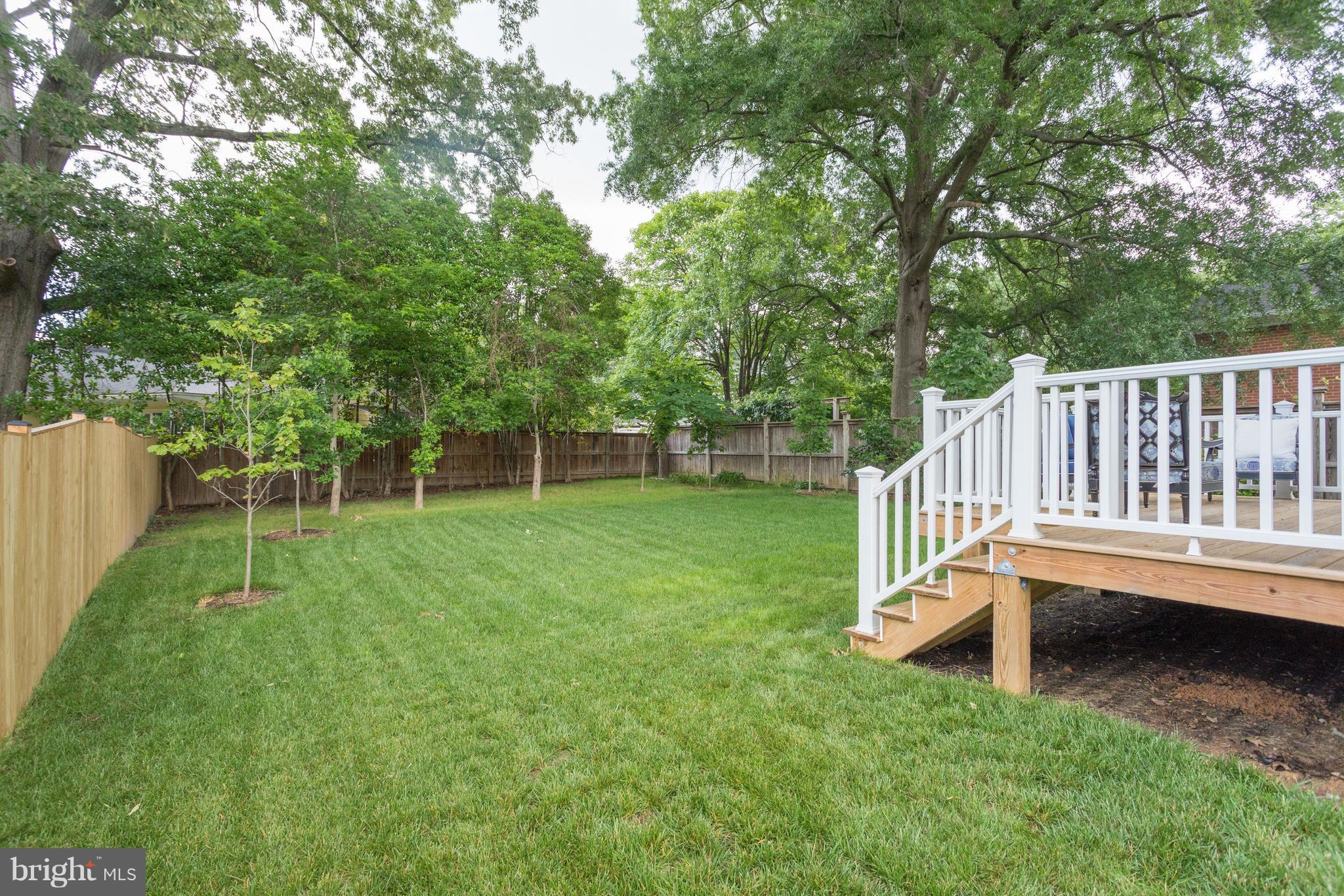 8115 Wellington Road Alexandria, VA 22308 - Photo 28 of 30 Lush lawn and full fenced backyard