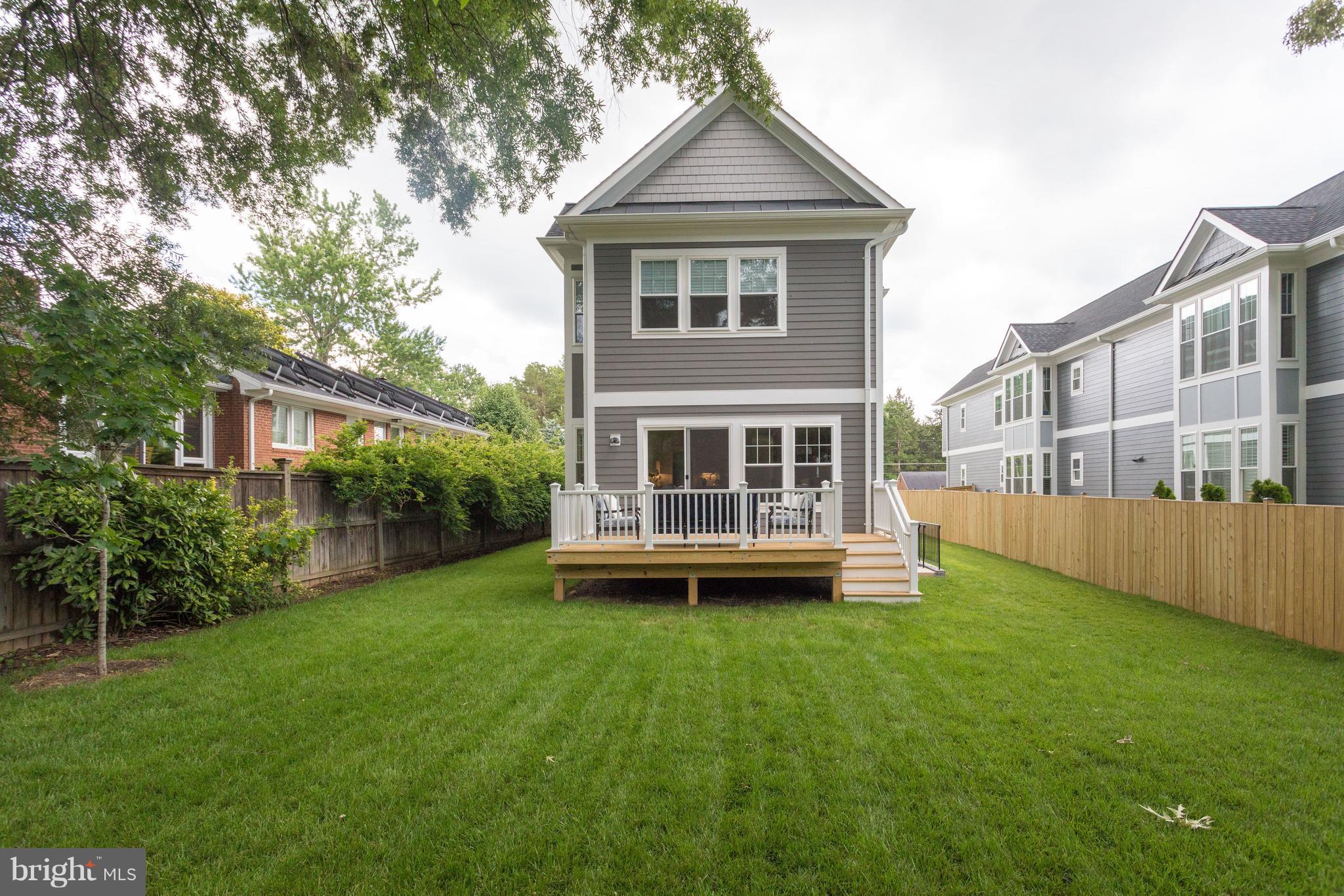 8115 Wellington Road Alexandria, VA 22308 - Photo 7 of 30 Lg fenced backyard with pressure-treated Trex deck