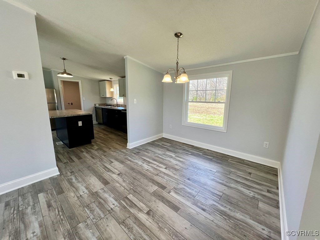 409 Remo Road Heathsville, VA 22473 - Photo 12 of 25 a view of empty room with wooden floor and fan