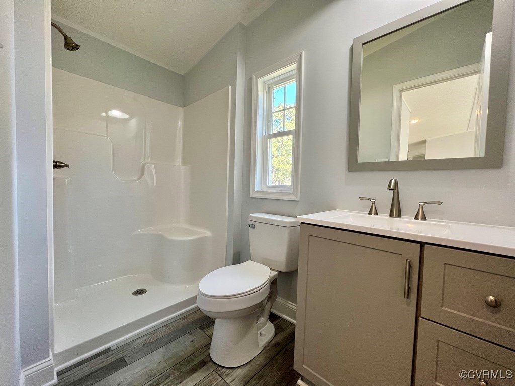 409 Remo Road Heathsville, VA 22473 - Photo 18 of 25 a bathroom with a sink toilet and shower
