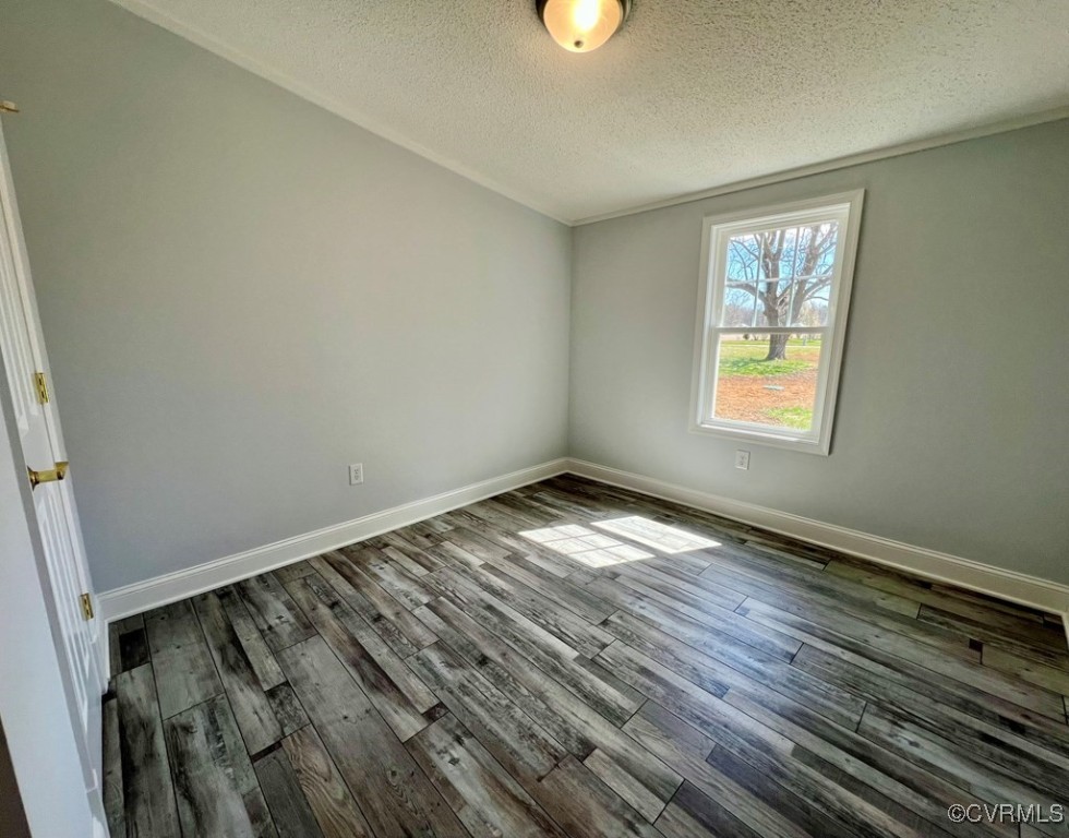 409 Remo Road Heathsville, VA 22473 - Photo 19 of 25 a view of empty room with wooden floor