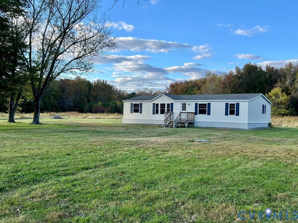 409 Remo Road Heathsville, VA 22473 - Photo 2 of 25 a house view with a outdoor space