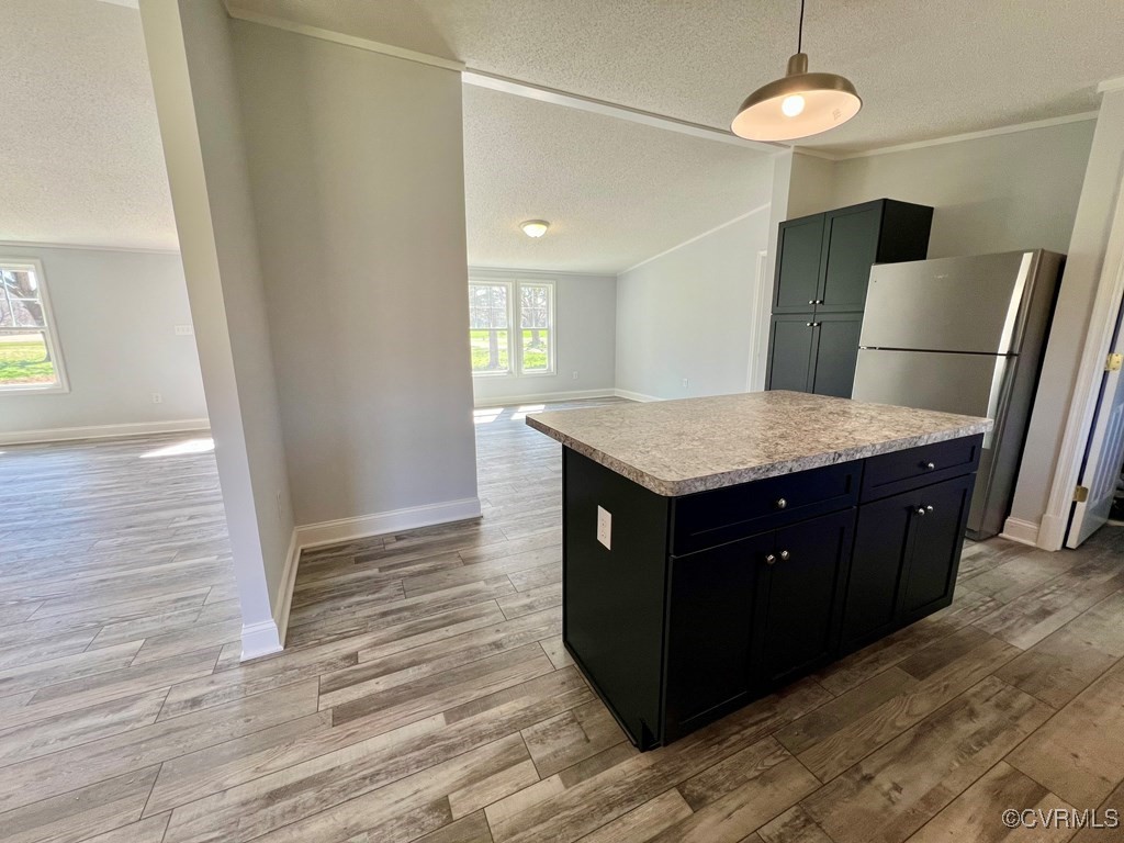 409 Remo Road Heathsville, VA 22473 - Photo 7 of 25 a room with a cabinets and wooden floor