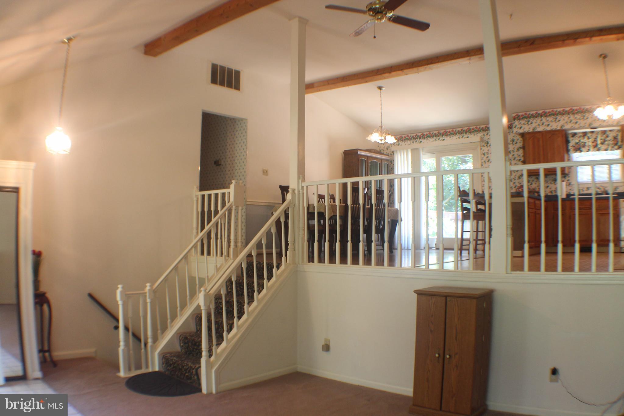 7811 Leland Road Manassas, VA 20111 - Photo 6 of 29 Steps Leading to Open Dining and Large Kitchen