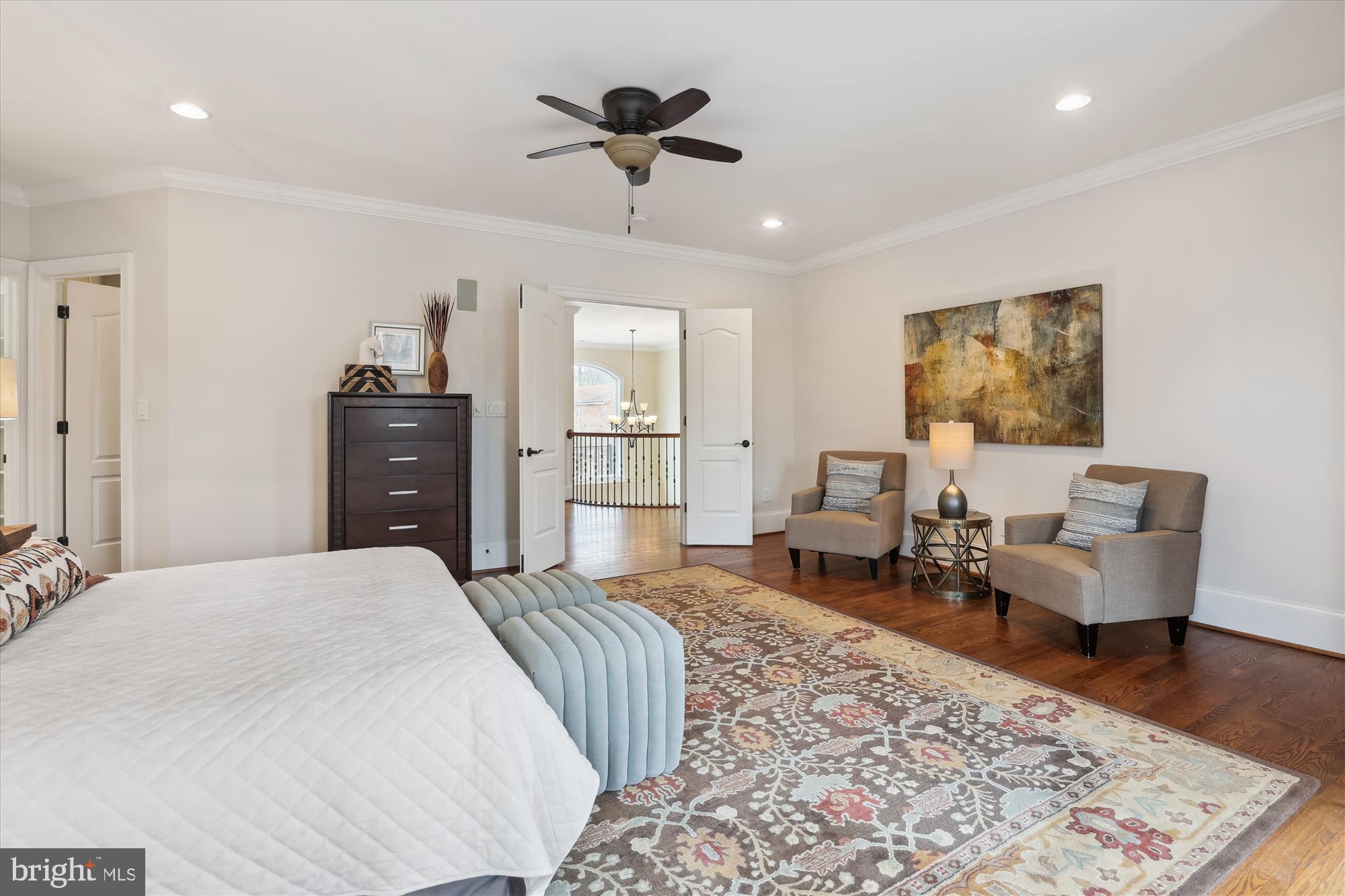 1217 Shenandoah Road Alexandria, VA 22308 - Photo 20 of 43 a bedroom with a bed and wooden floor