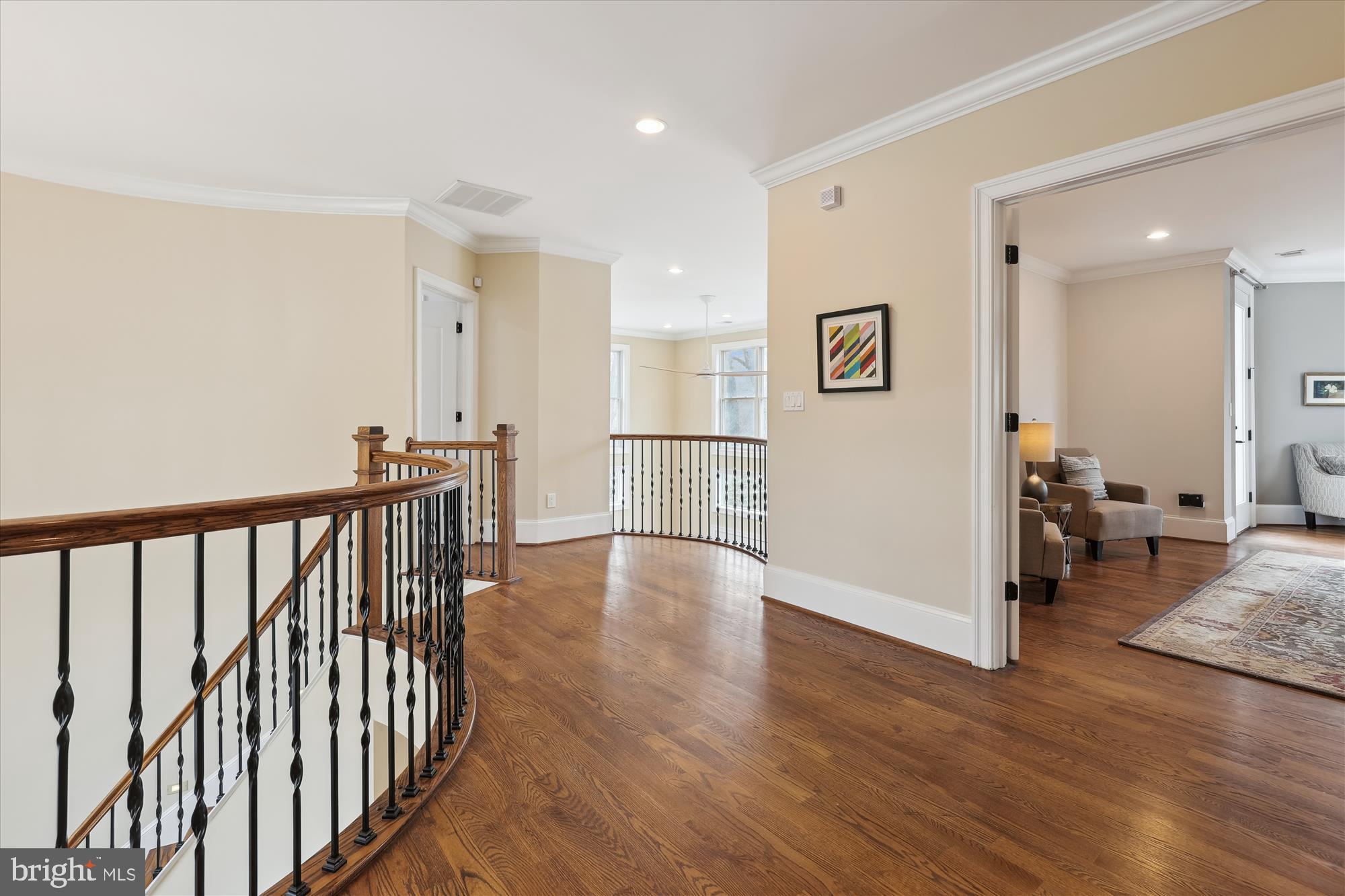 1217 Shenandoah Road Alexandria, VA 22308 - Photo 24 of 43 a view of a hallway with wooden floor and dining room