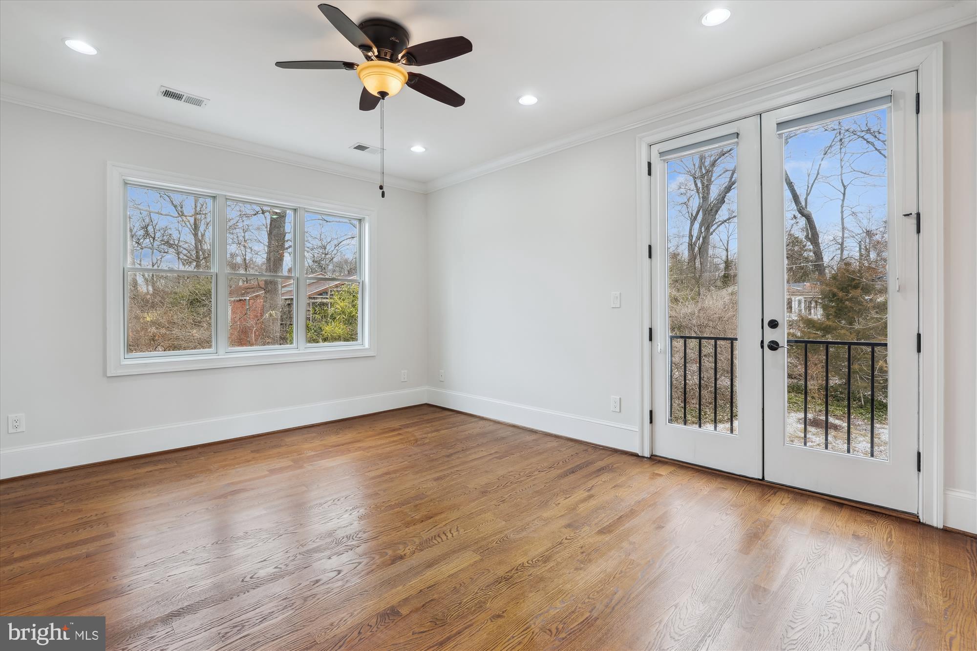1217 Shenandoah Road Alexandria, VA 22308 - Photo 26 of 43 wooden floor in an empty room with a window