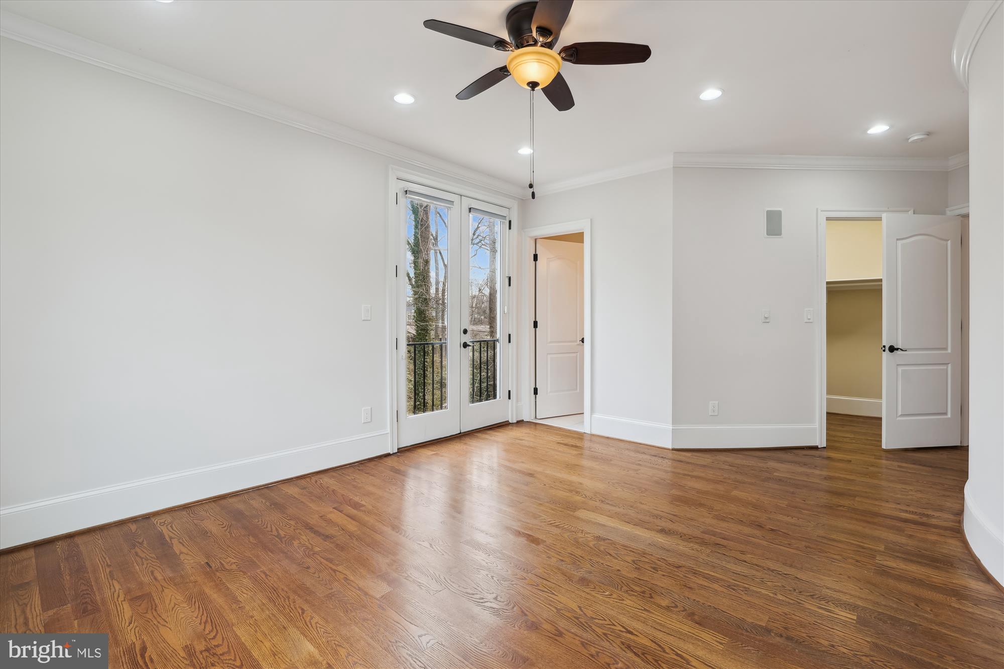 1217 Shenandoah Road Alexandria, VA 22308 - Photo 28 of 43 a view of a room with wooden floor and ceiling fan