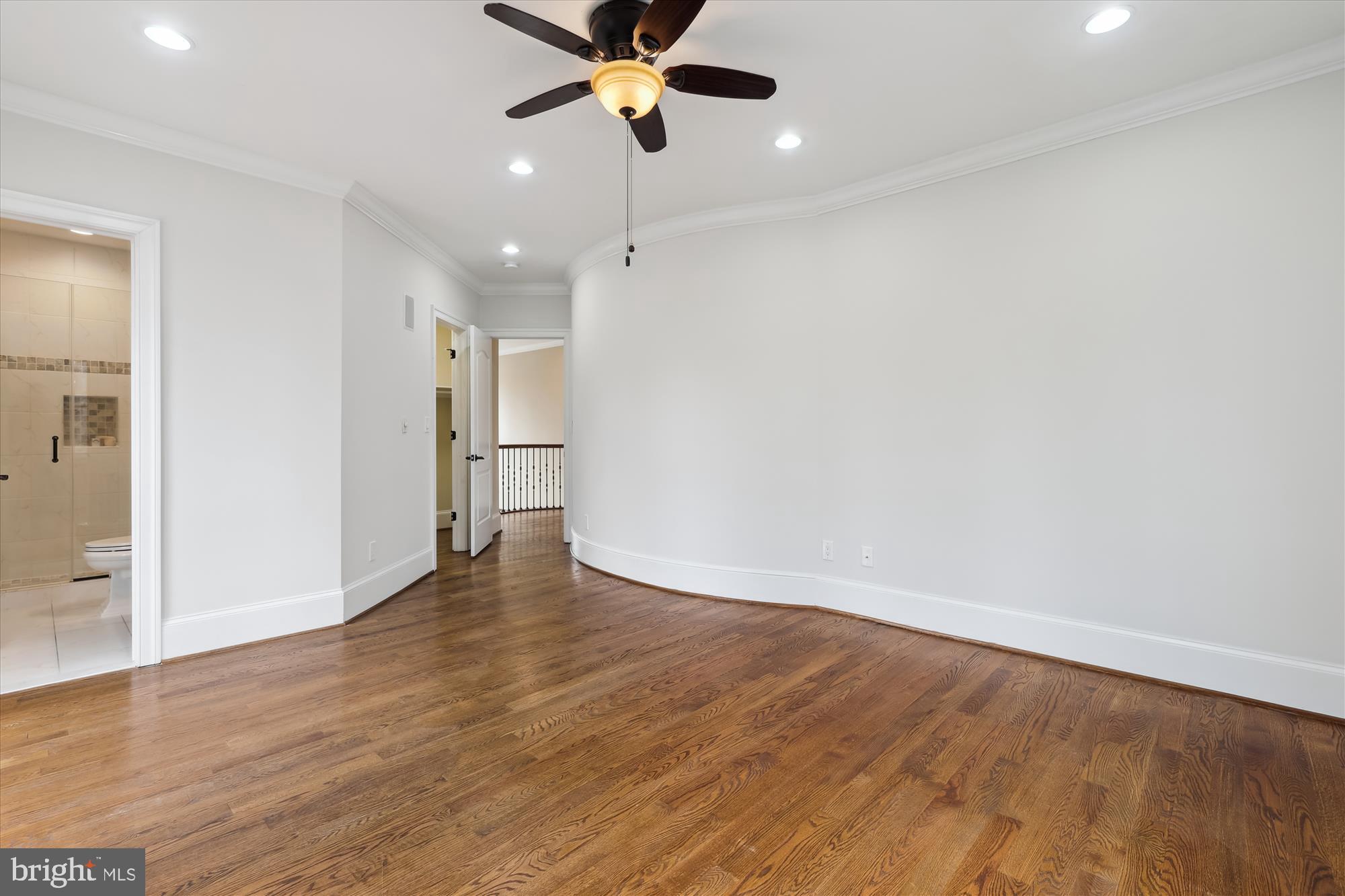 1217 Shenandoah Road Alexandria, VA 22308 - Photo 34 of 43 a view of empty room with wooden floor and fan