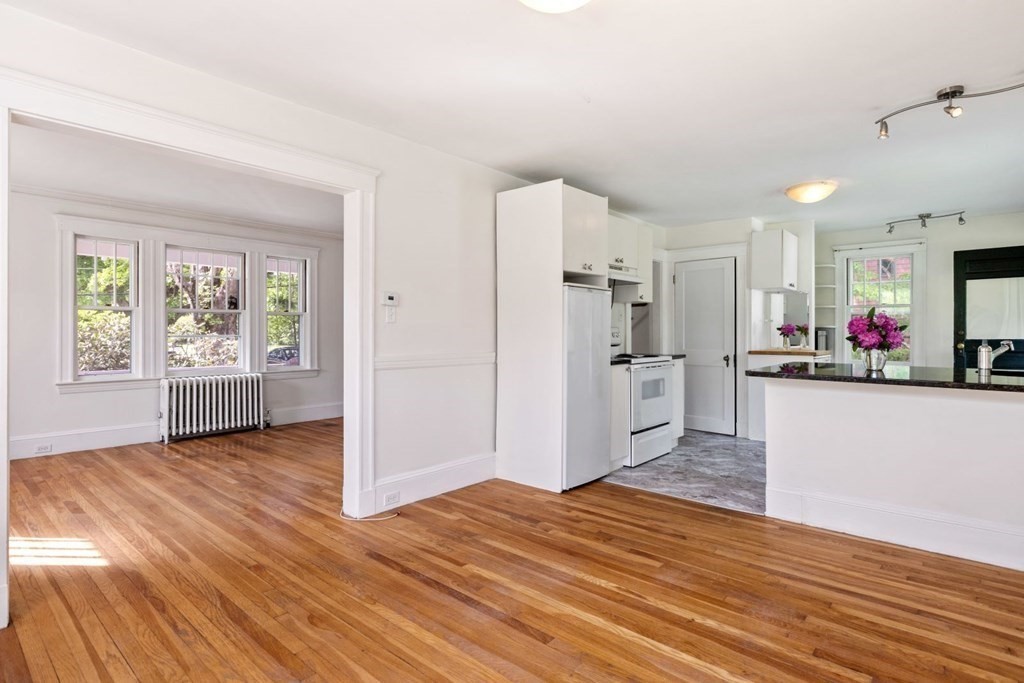 264 Lincoln Road Lincoln, MA 01773 - Photo 11 of 31 a view of a kitchen with wooden floor and a window