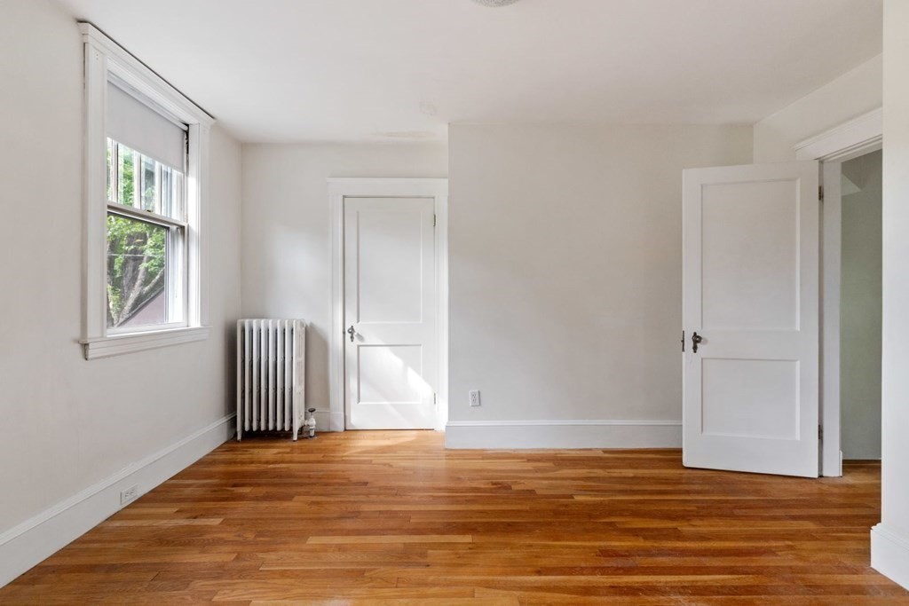 264 Lincoln Road Lincoln, MA 01773 - Photo 15 of 31 a view of empty room with wooden floor and fan