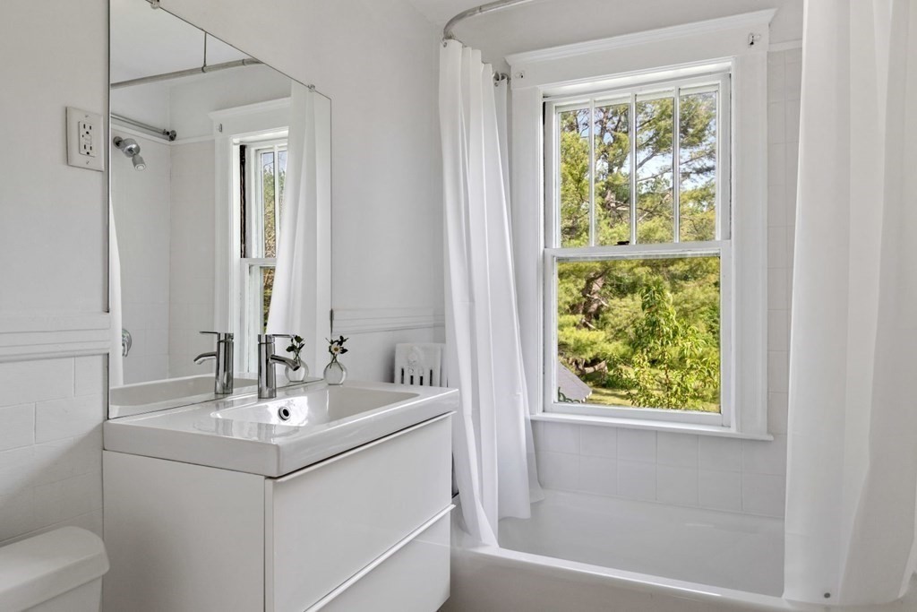 264 Lincoln Road Lincoln, MA 01773 - Photo 18 of 31 a bathroom with a sink and a mirror