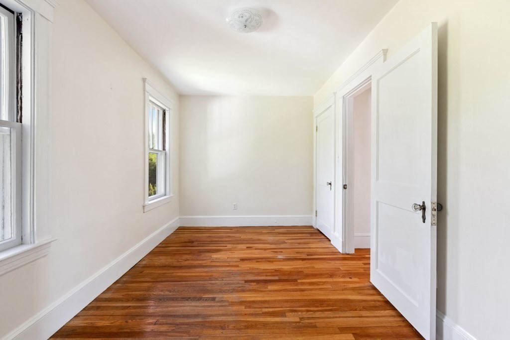 264 Lincoln Road Lincoln, MA 01773 - Photo 21 of 31 a view of a room with wooden floor and window