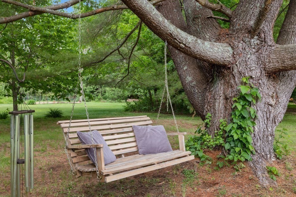 264 Lincoln Road Lincoln, MA 01773 - Photo 25 of 31 a view of a bench in the garden