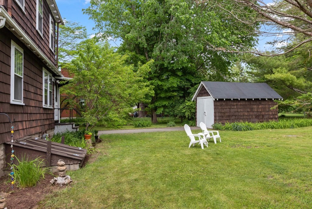 264 Lincoln Road Lincoln, MA 01773 - Photo 28 of 31 a view of a house with a yard