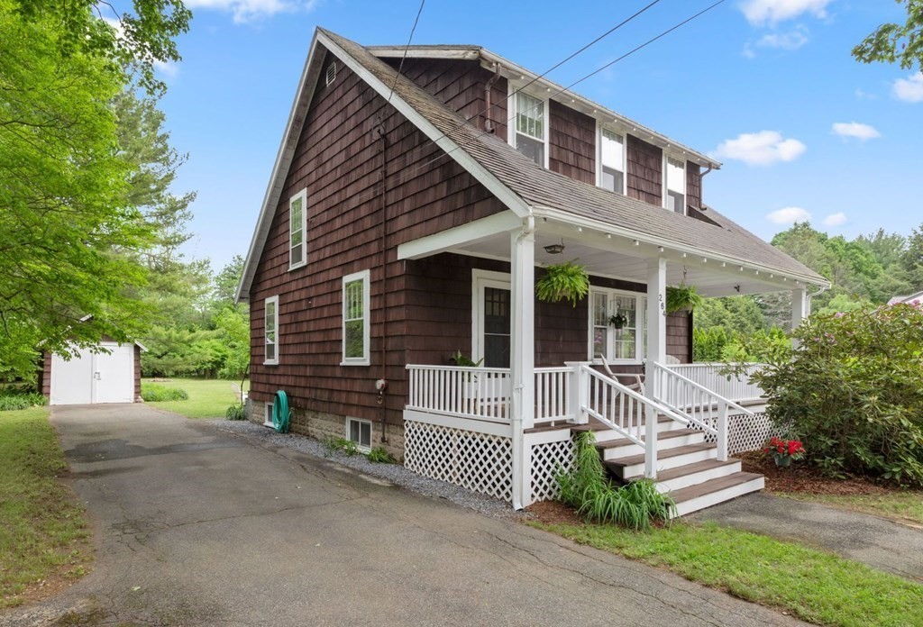 264 Lincoln Road Lincoln, MA 01773 - Photo 31 of 31 a front view of a house with garden