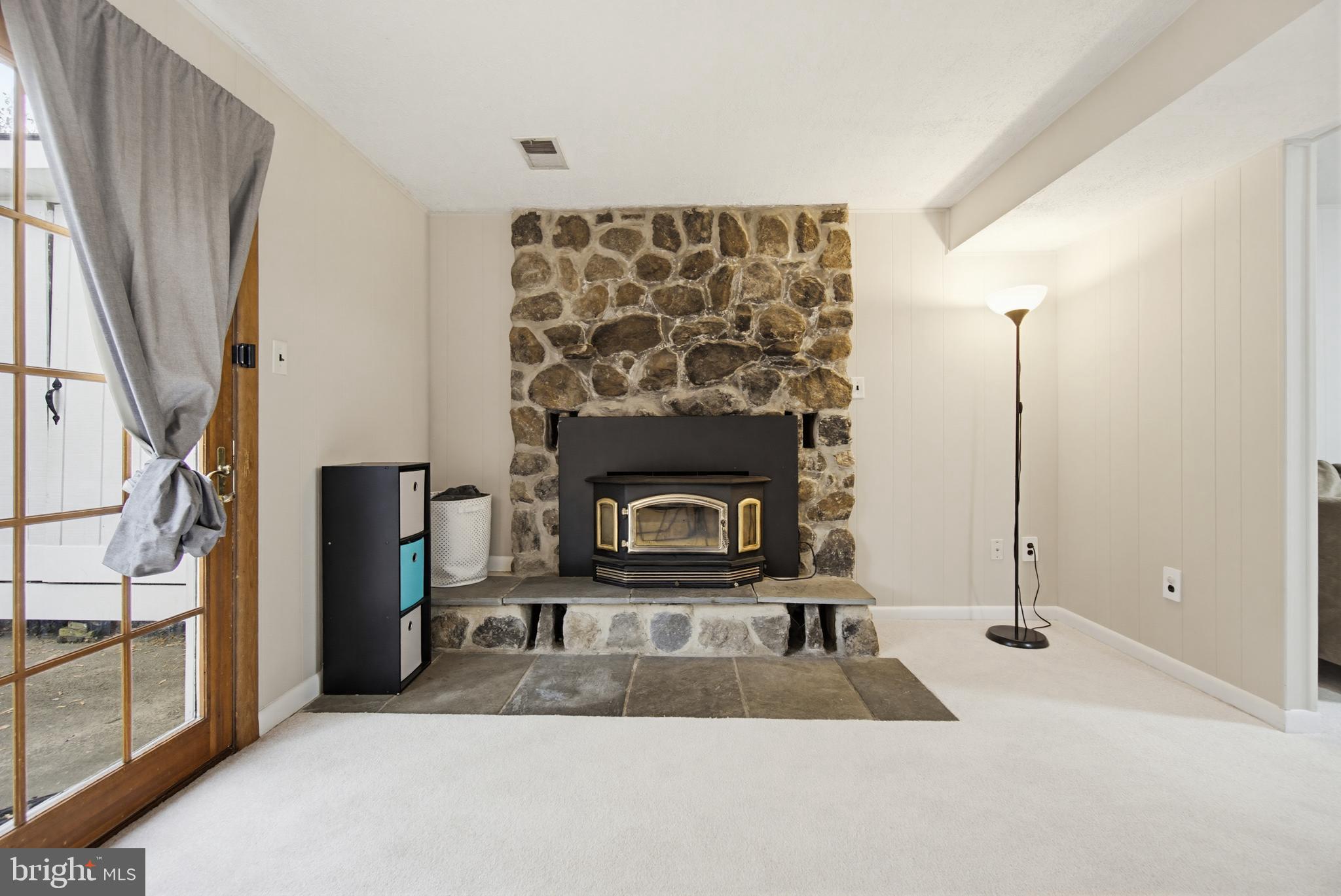 977 Fall Cir Way Gambrills, MD 21054 - Photo 30 of 35 Lower Level Den with Fireplace