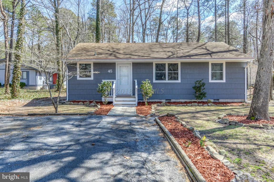 45 Abbyshire Road Ocean Pines, MD 21811 - Photo 1 of 37 front view of a house with a yard