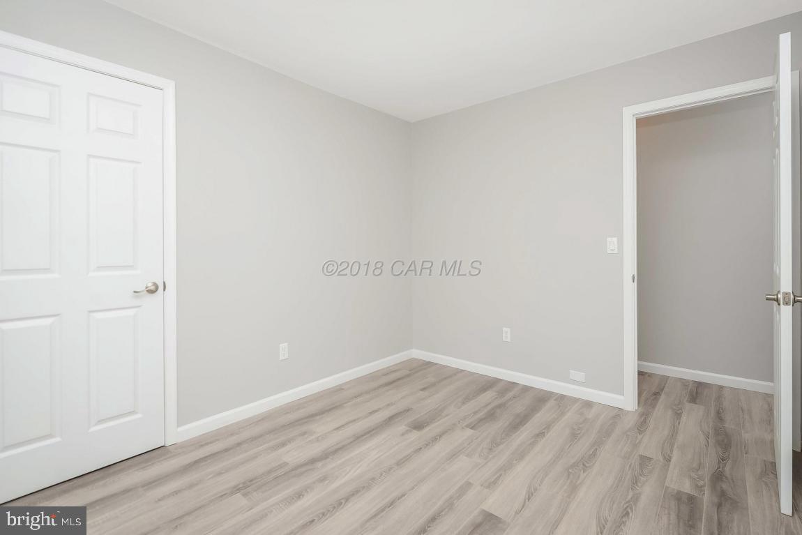 45 Abbyshire Road Ocean Pines, MD 21811 - Photo 18 of 37 a view of room with wooden floor
