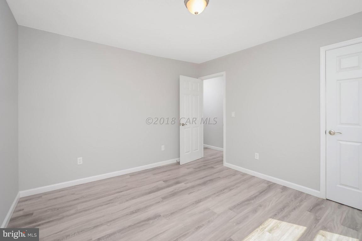 45 Abbyshire Road Ocean Pines, MD 21811 - Photo 26 of 37 wooden floor in an empty room
