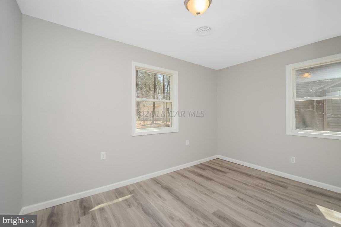 45 Abbyshire Road Ocean Pines, MD 21811 - Photo 30 of 37 an empty room with a window