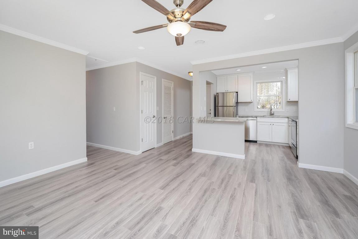 45 Abbyshire Road Ocean Pines, MD 21811 - Photo 6 of 37 a view of a kitchen with wooden floor and a kitchen view