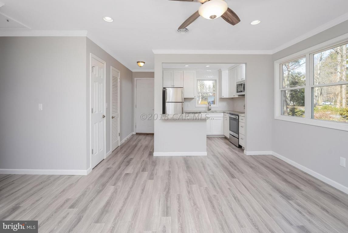 45 Abbyshire Road Ocean Pines, MD 21811 - Photo 7 of 37 a view of a kitchen with a sink and wooden floor