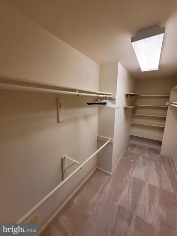 a view of a room with racks on the wall