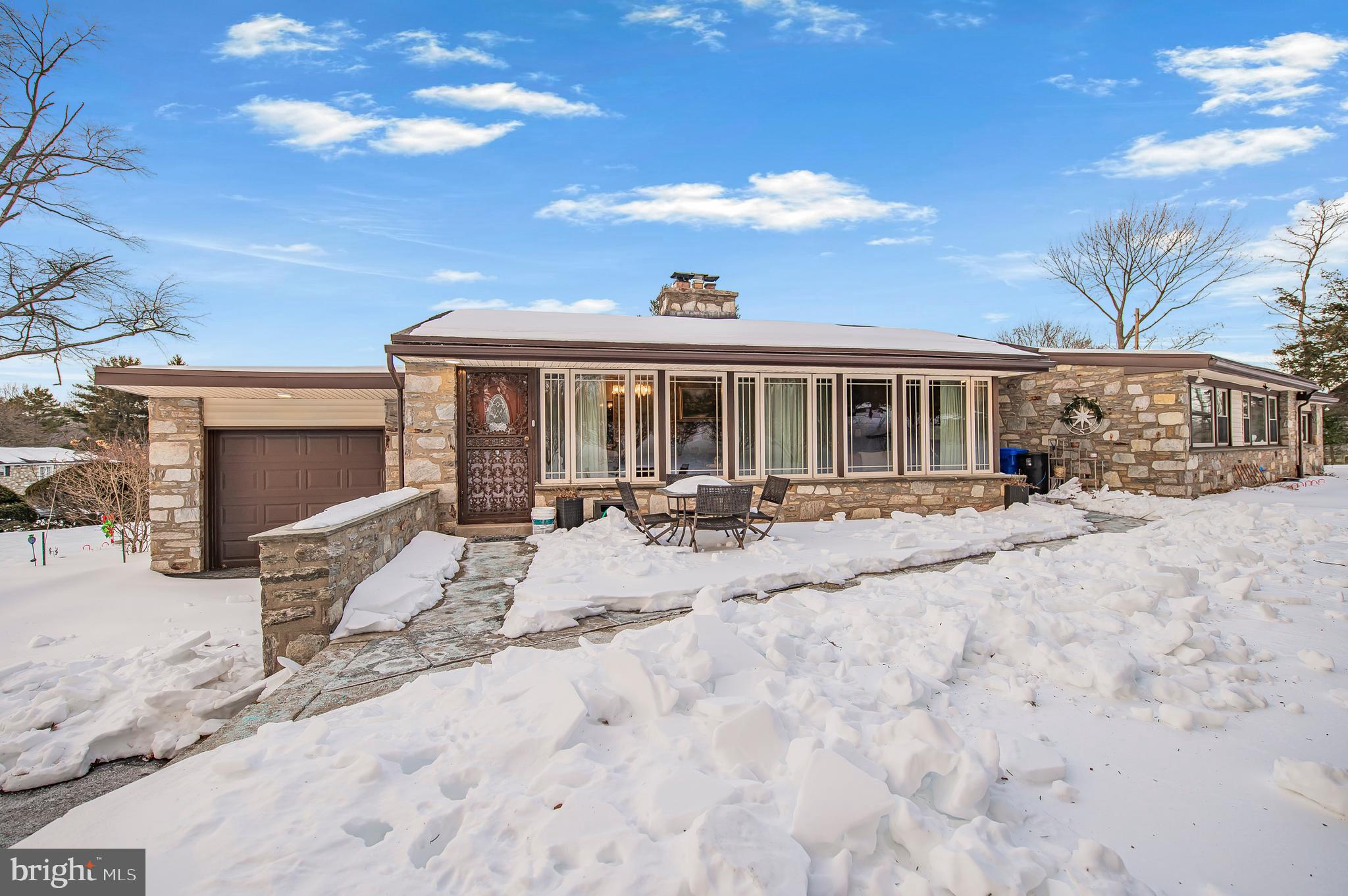 2409 Ashbourne Road Wyncote, PA 19095 - Photo 1 of 36 a view of a house with a patio