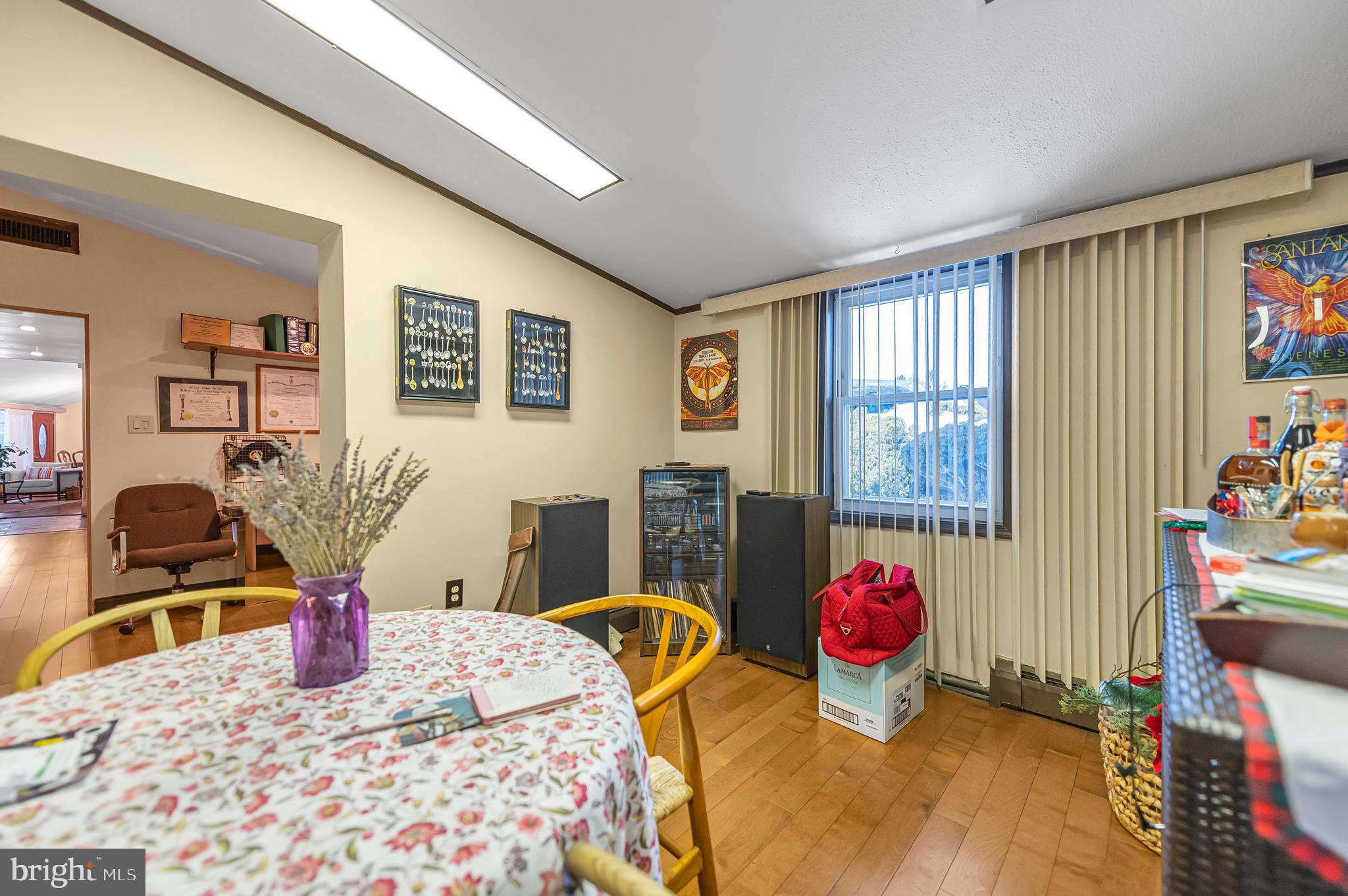 2409 Ashbourne Road Wyncote, PA 19095 - Photo 25 of 36 a bedroom with a bed dresser and a large window