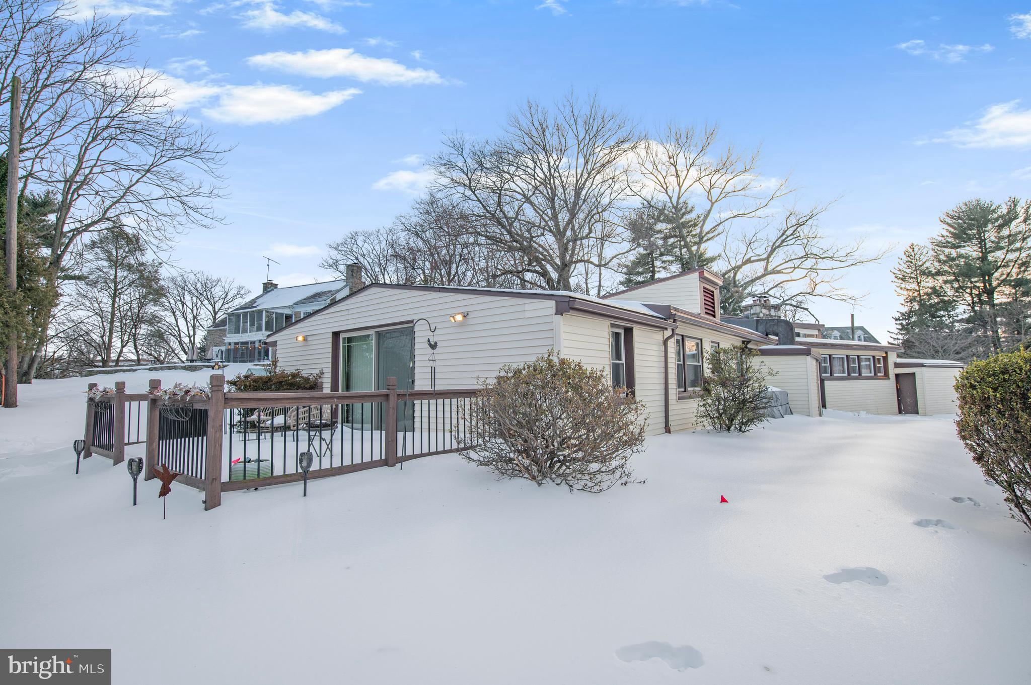2409 Ashbourne Road Wyncote, PA 19095 - Photo 31 of 36 a view of a house with a snow in the yard