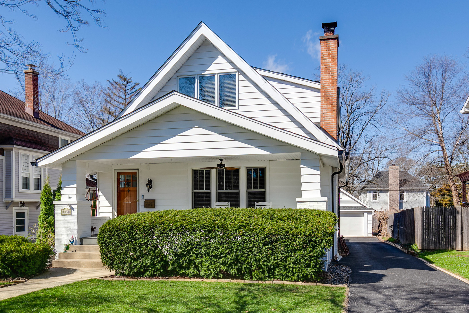 1050 Springfield Avenue Deerfield, IL 60015 - Photo 1 of 20 a front view of a house with a yard