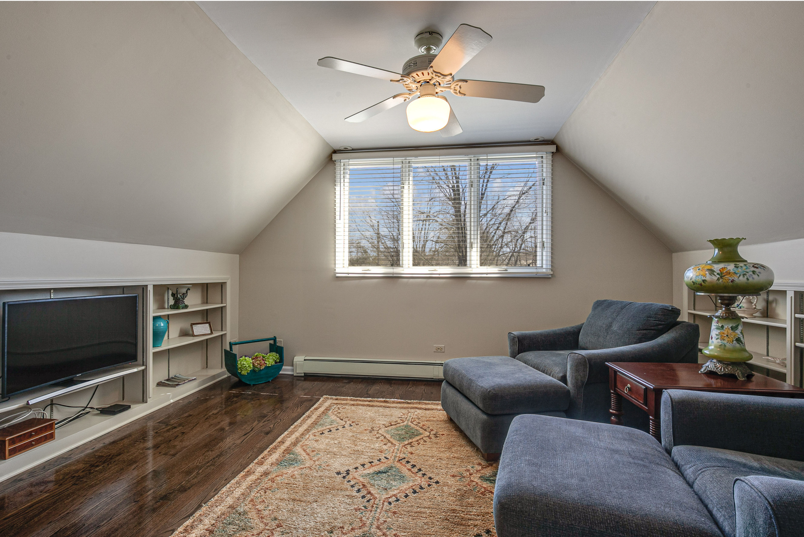 1050 Springfield Avenue Deerfield, IL 60015 - Photo 13 of 20 a living room with furniture and a flat screen tv