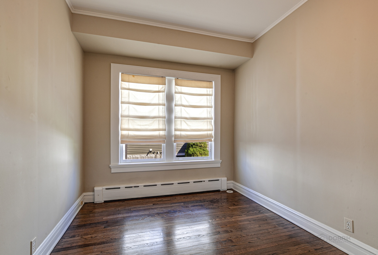 1050 Springfield Avenue Deerfield, IL 60015 - Photo 15 of 20 an empty room with wooden floor and windows