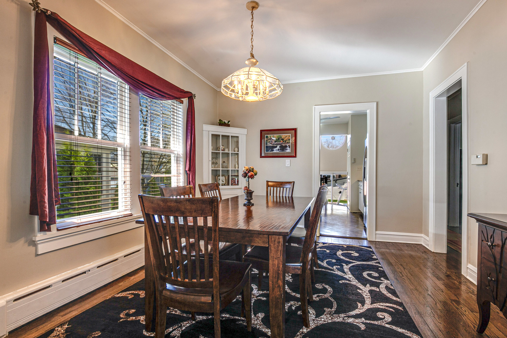 1050 Springfield Avenue Deerfield, IL 60015 - Photo 5 of 20 a view of a dining room with furniture window and wooden floor