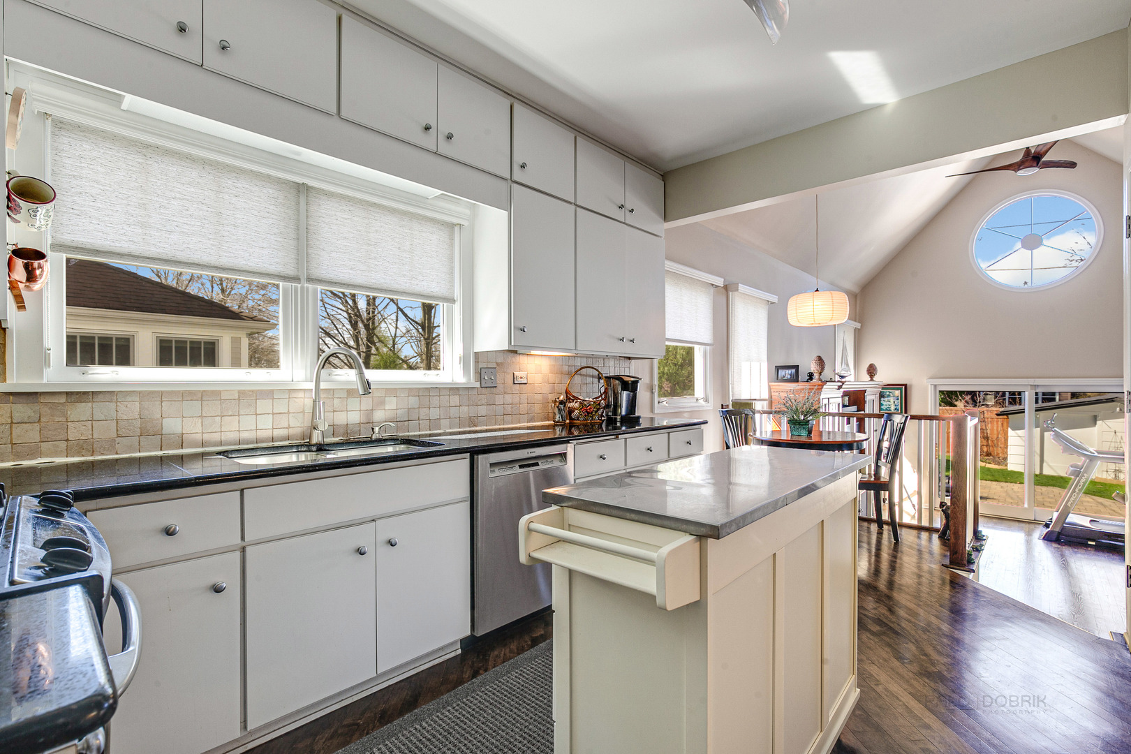 1050 Springfield Avenue Deerfield, IL 60015 - Photo 7 of 20 a kitchen with granite countertop a sink and cabinets
