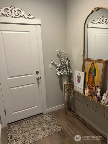 a view of a storage & utility room with a washer dryer