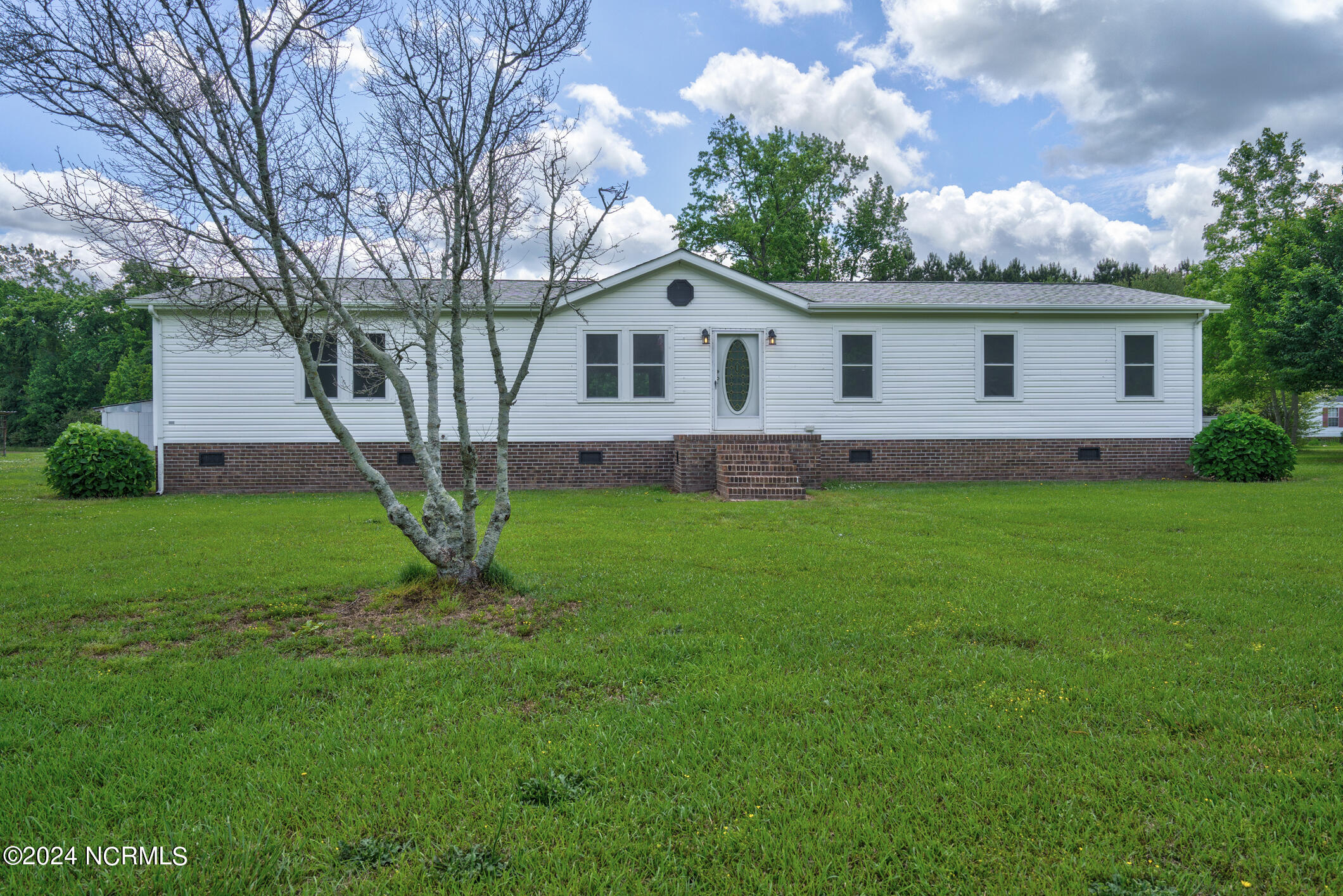 322 Ebenezer Road Whitakers, NC 27891 - Photo 2 of 40 003-322EbenezerRoad-Whitakers-NC-27891-F