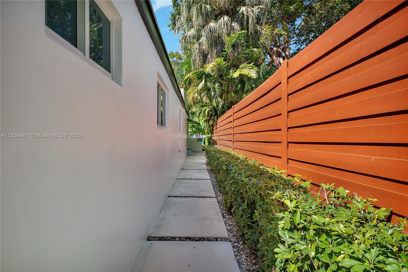 4033 South Le Jeune Road Miami, FL 33146 - Photo 23 of 24 a backyard of a house with lots of green space