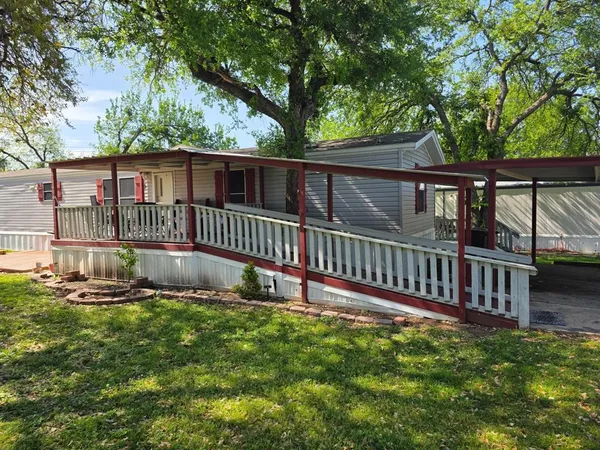 a view of a deck with a fence
