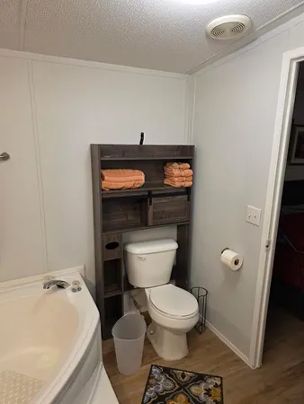 a bathroom with a sink and toilet
