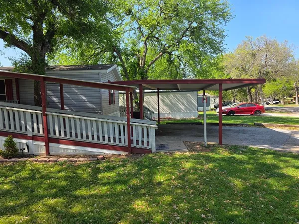 a view of a deck with a back yard