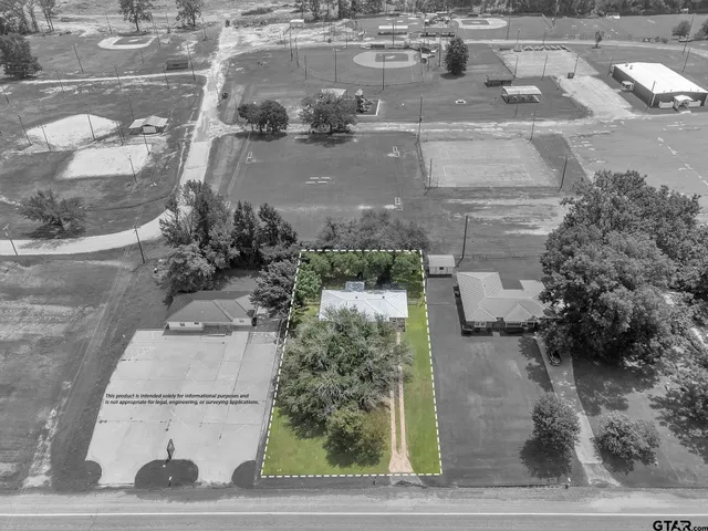 a view of a street with a bench