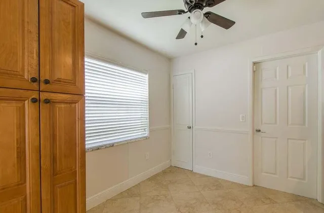 a view of an empty room and window