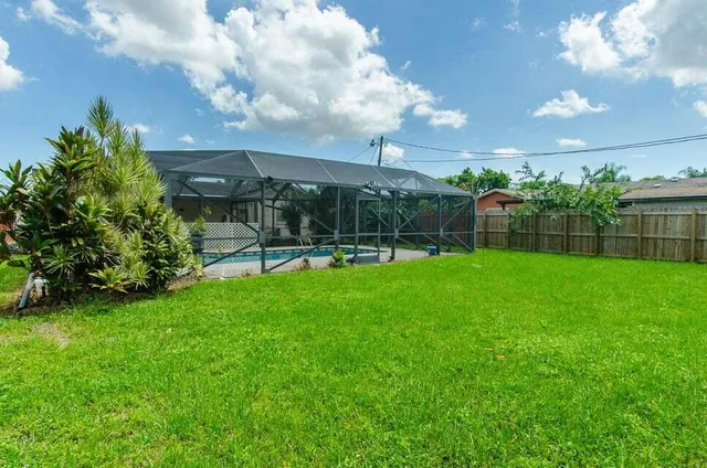 a view of a backyard with a garden