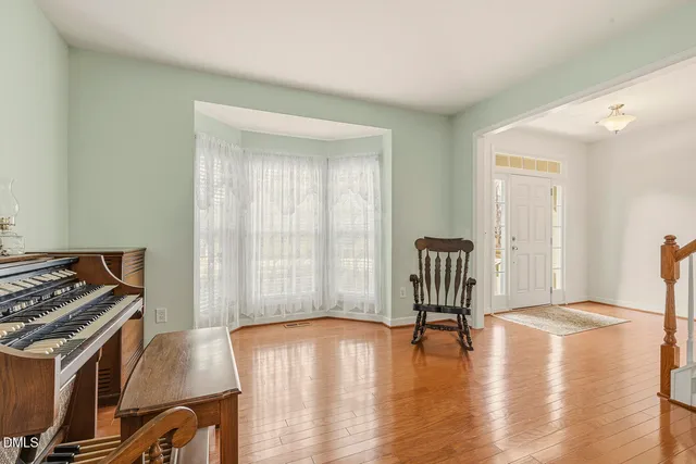 a view of a dining room with furniture