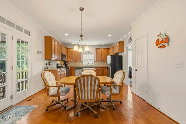 a kitchen with a sink stove and microwave